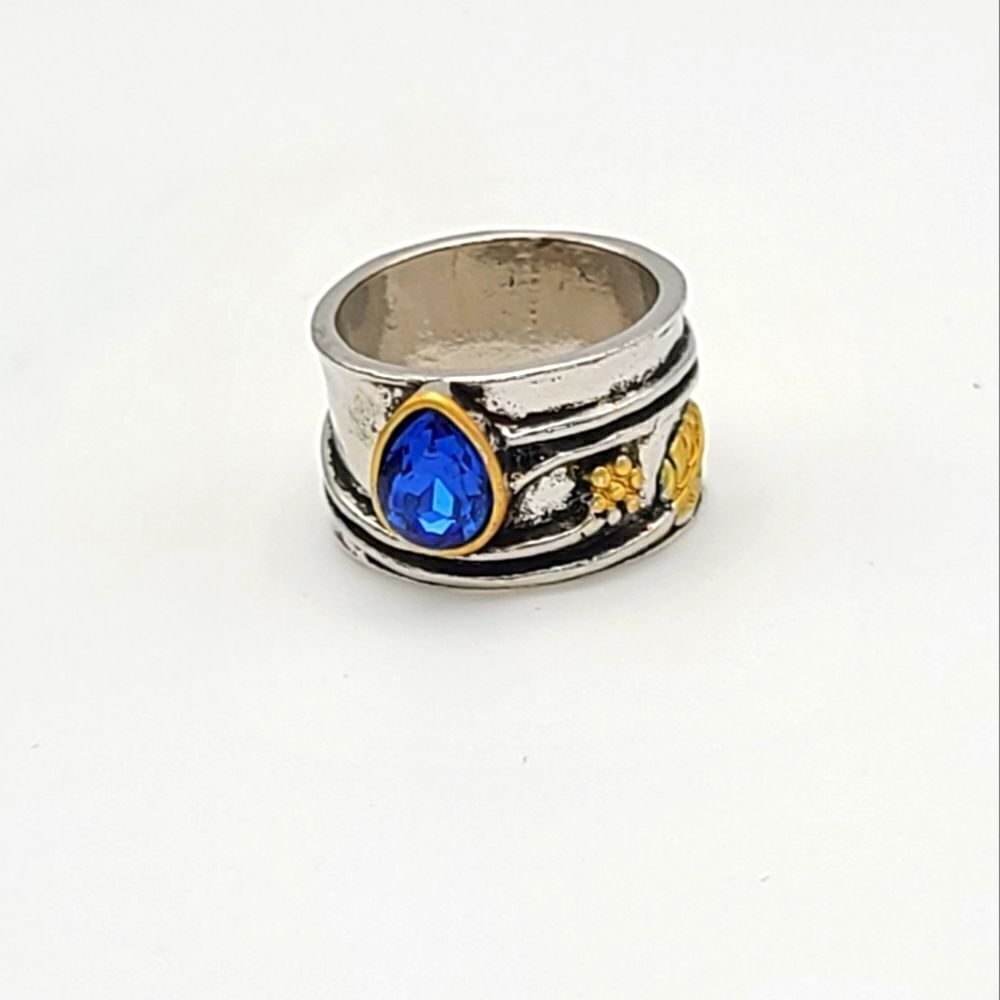 sterling silver with goldtone accent, teardrop blue stone Unisex